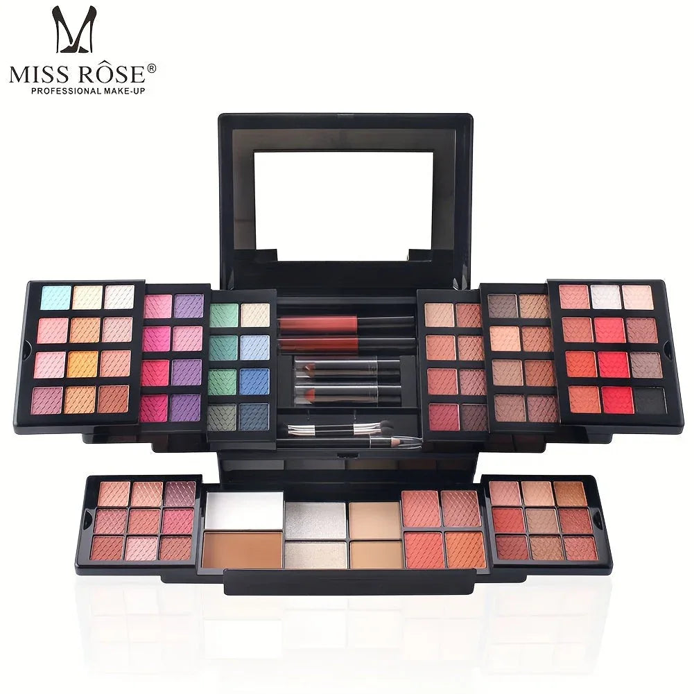 Folding makeup palette with multi-colored eyeshadows, lipsticks, and brushes in a black plastic case with a mirror.
