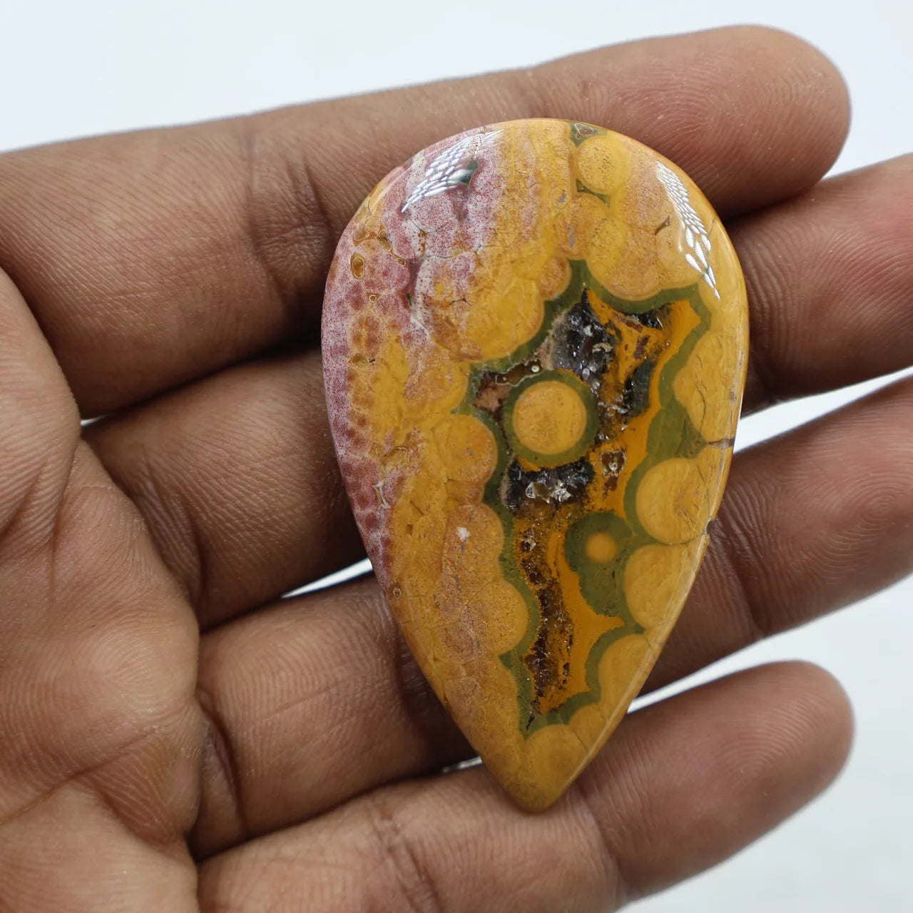 Ocean jasper druzy cabochon, teardrop shape with amber yellow and purple mottled banding