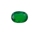 Green oval faceted loose gemstone, smooth polished edges