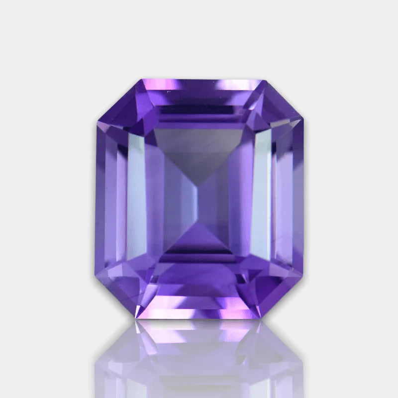 Front view emerald-cut purple amethyst gemstone with mirrored reflection below
