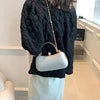 Silver evening clutch, designer handbag with crystal-embellished top handle, chic PU leather, for wedding party wear.
