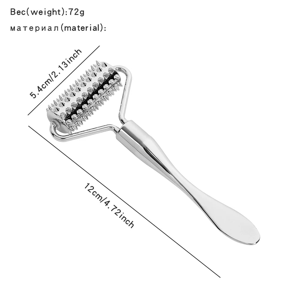 Silver zinc alloy facial massager with a textured, studded roller and spatula-shaped handle with dimension labels.