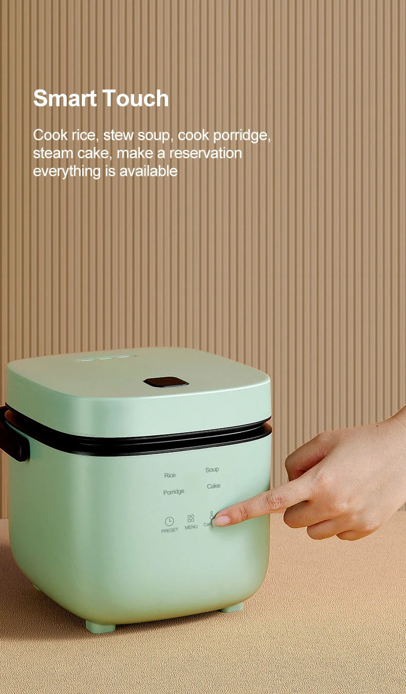 Mint-green rice cooker with touchscreen control on top lid, compact countertop size