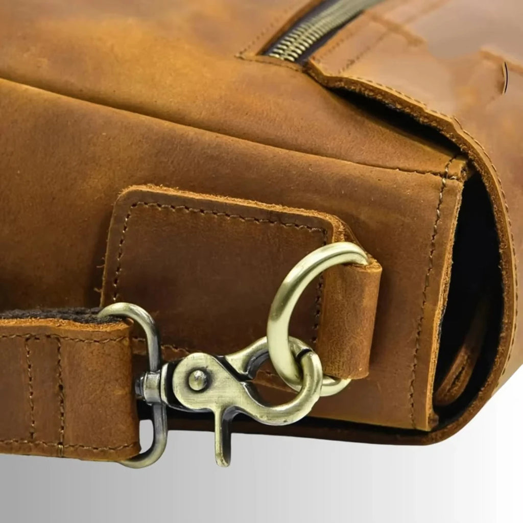 Luxury brown leather men's business briefcase with vintage brass swivel clasp and reinforced stitching. Trunk style.