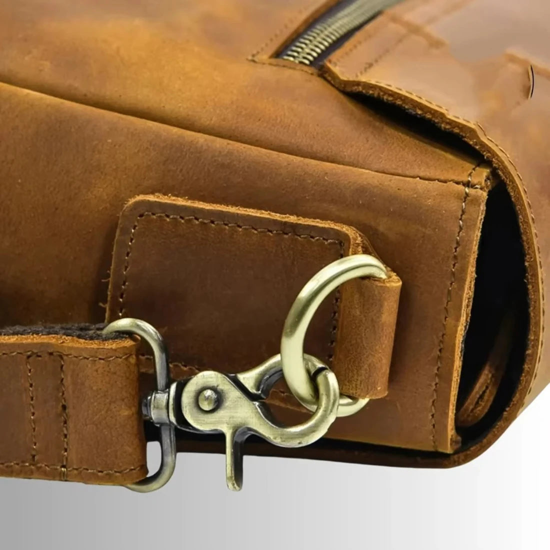 Luxury brown leather men's business briefcase with vintage brass swivel clasp and reinforced stitching. Trunk style.