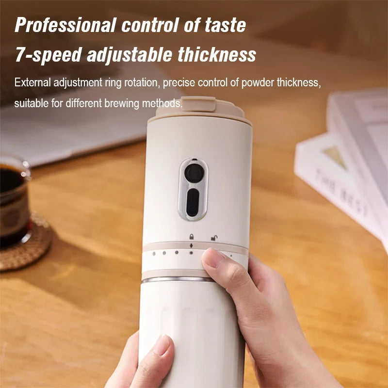 Portable beige coffee grinder with 7-speed adjustable thickness dial for precise grind control.