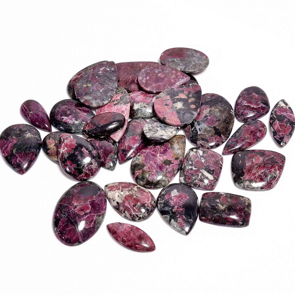Loose gemstone cabochon lot of polished freeform stones, magenta and purple with light speckled patches