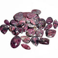 Loose gemstone cabochon lot of polished freeform stones, magenta and purple with light speckled patches
