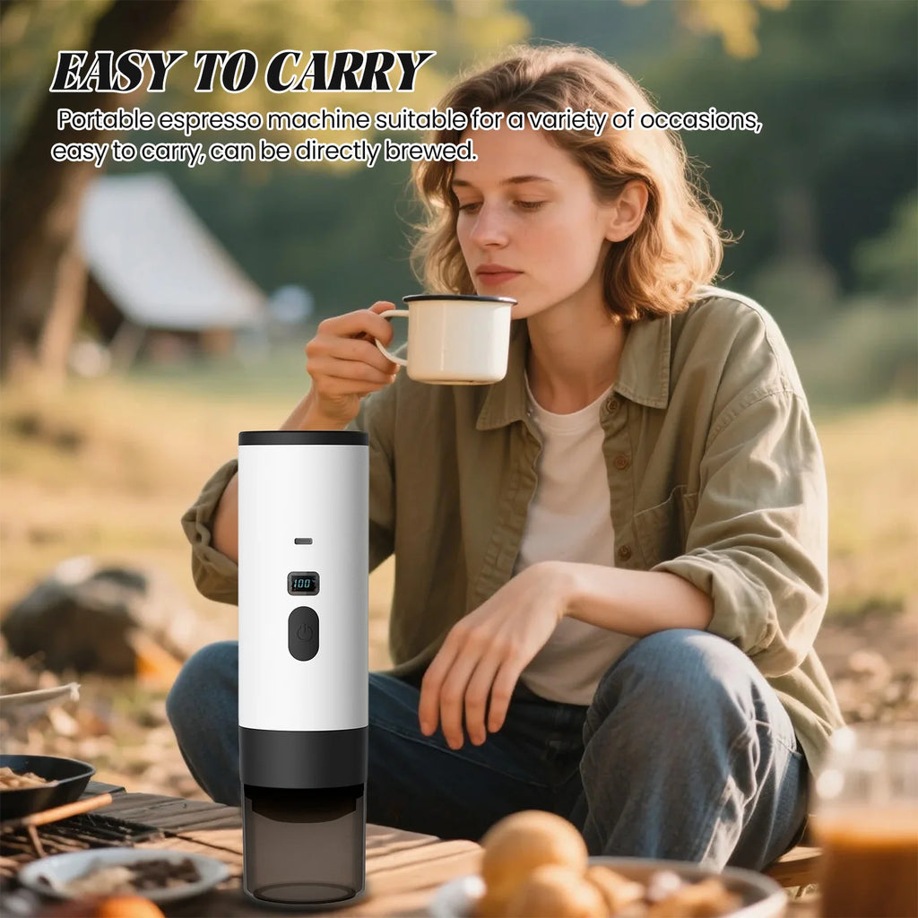 White portable espresso machine with digital display, ideal for outdoor camping and brewing coffee on the go.