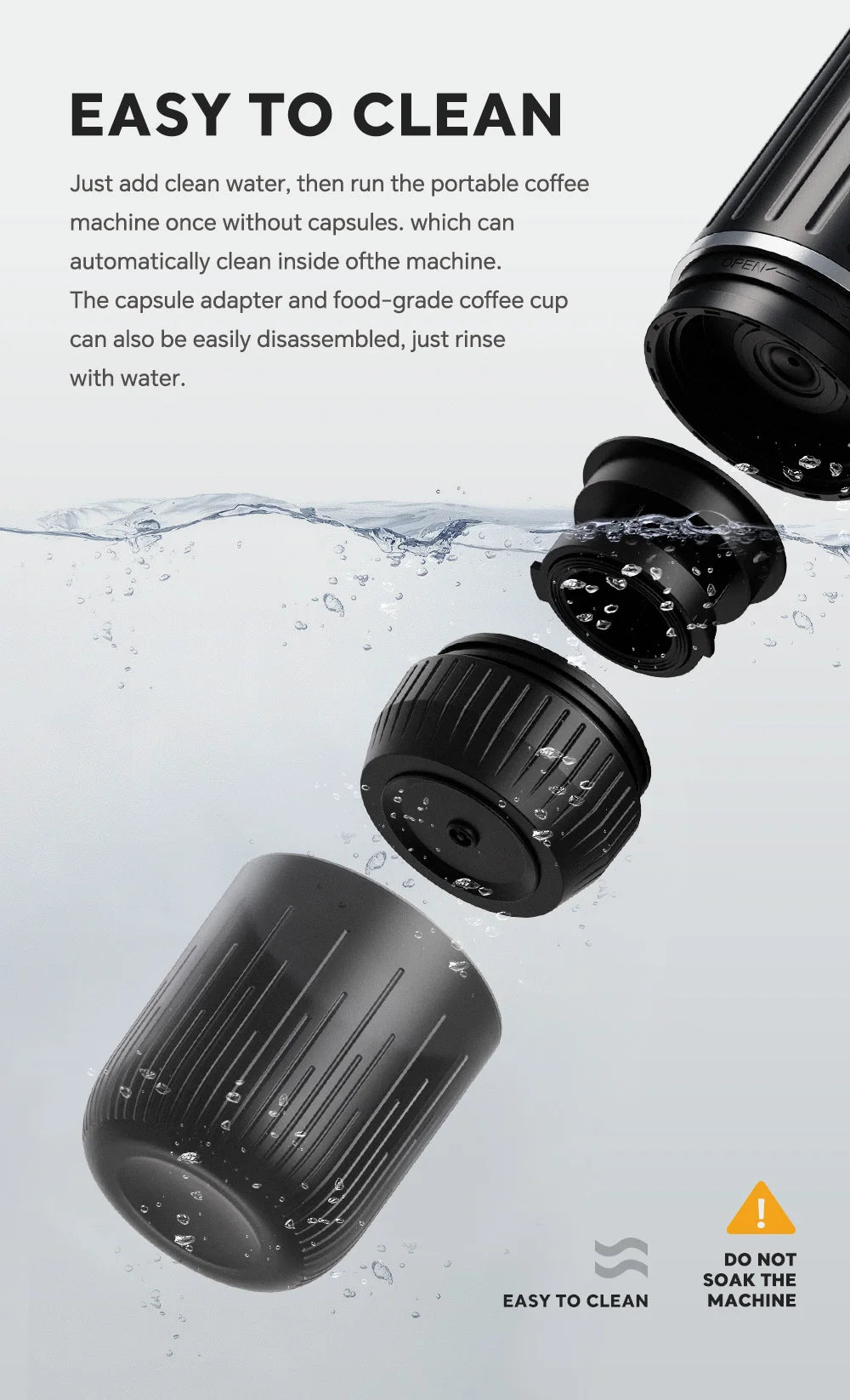 Black portable coffee maker showing disassembled parts and capsule adapter being rinsed in water for easy cleaning.