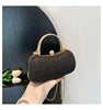 Black PU evening clutch bag with crystal-adorned handle, gold clasp, and shoulder chain for wedding dinner parties.
