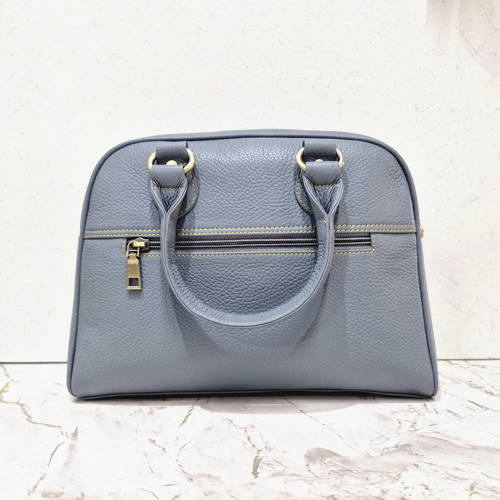 Grey genuine leather mini tote designer handbag with top handles, zipper pocket, and contrast stitching detail.