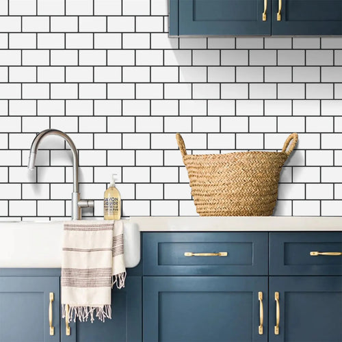 White peel-and-stick 3D brick tile wall decals covering a kitchen backsplash area