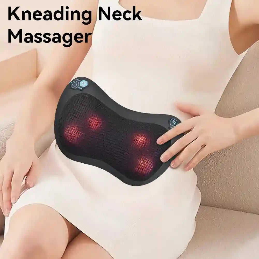 Black, curved Shiatsu massage pillow with four glowing red heating nodes, held against a person's torso.