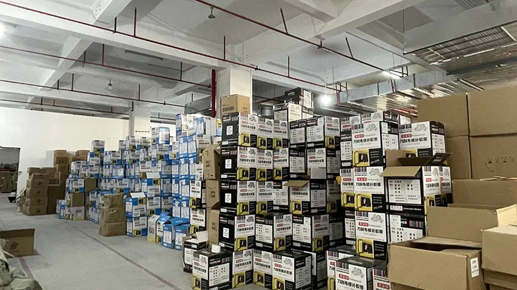 Warehouse racks filled with cartons for roof repair flashing tape