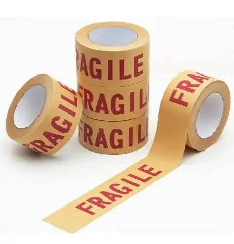 Kraft paper packaging tape printed with red “FRAGILE” text, natural brown roll