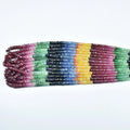 Straight multicolor faceted rondelle bead strand with maroon, green, blue, and yellow beads