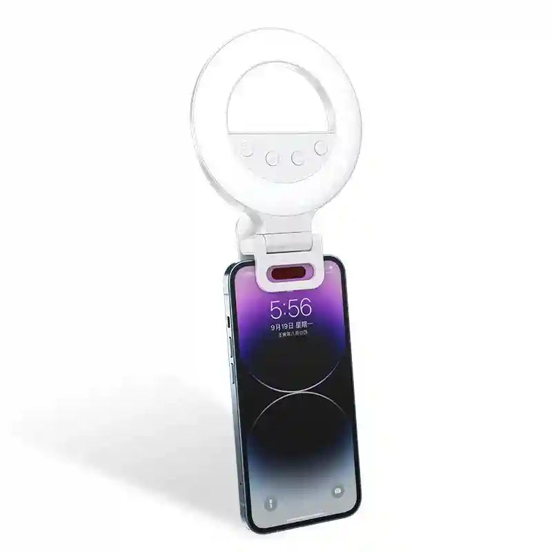 White circular clip-on LED ring light attached to a smartphone for improved lighting in selfies and video calls.