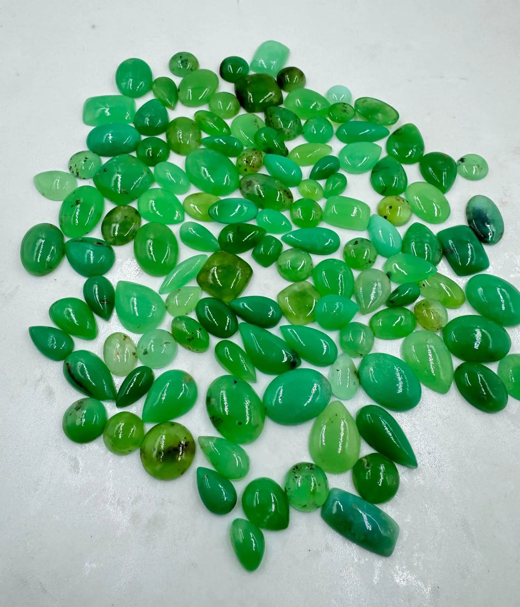 Loose green chrysoprase cabochon mix, oval and teardrop shapes