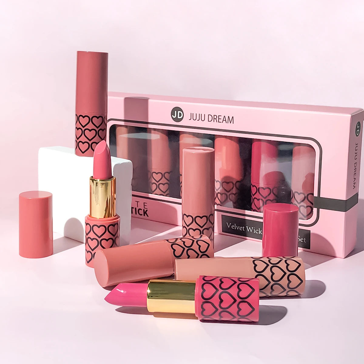 Set of 6 long-wear matte nude lipsticks in a heart-print box. High-pigment, non-staining velvet lip makeup collection.