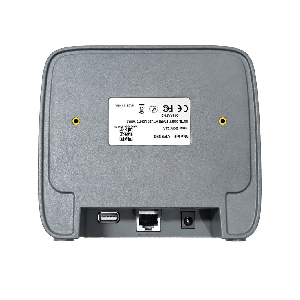 Desktop barcode scanner bottom/ports panel with USB and network ports, dark gray