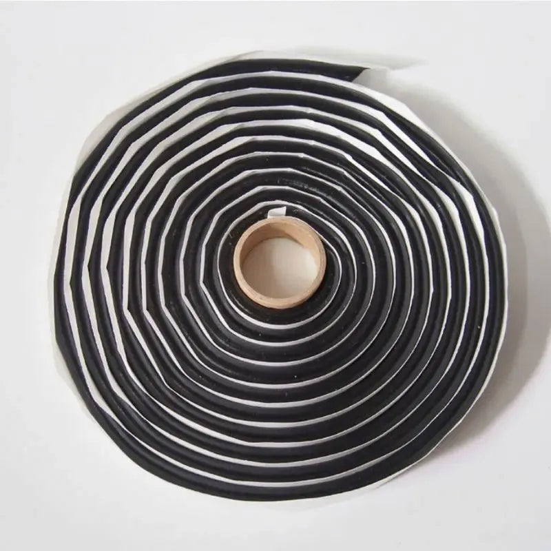 Black sealant butyl tape roll with concentric layers, protective backing visible