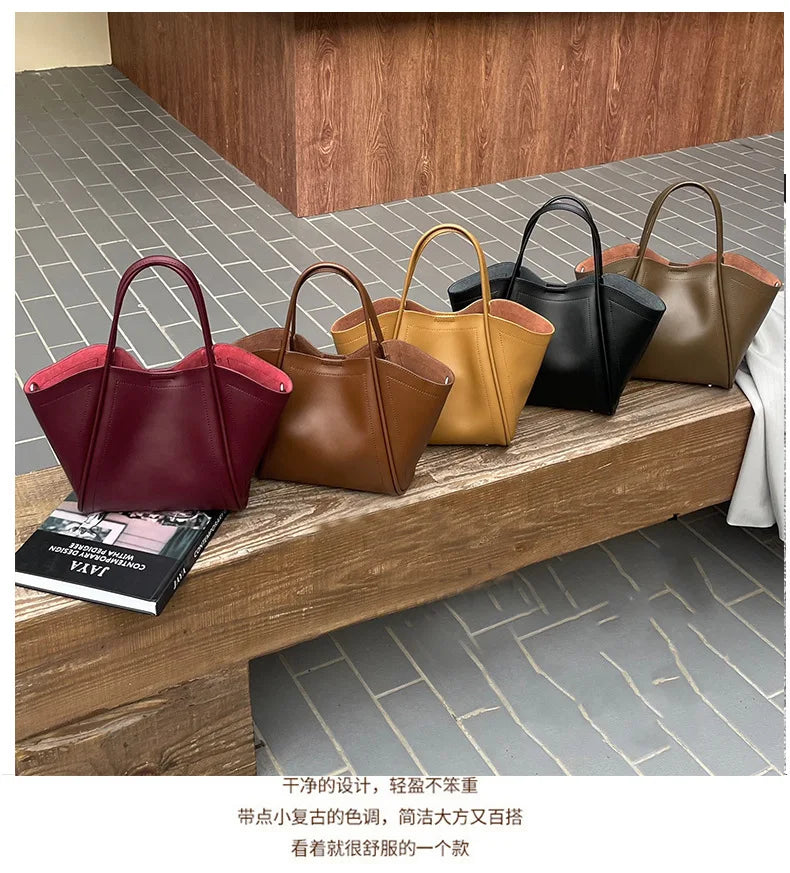 2025 Autumn Winter High-End Niche Genuine Leather Wing Bag Large Capacity Commuter Shoulder Promotional Drawstring Sportpacks