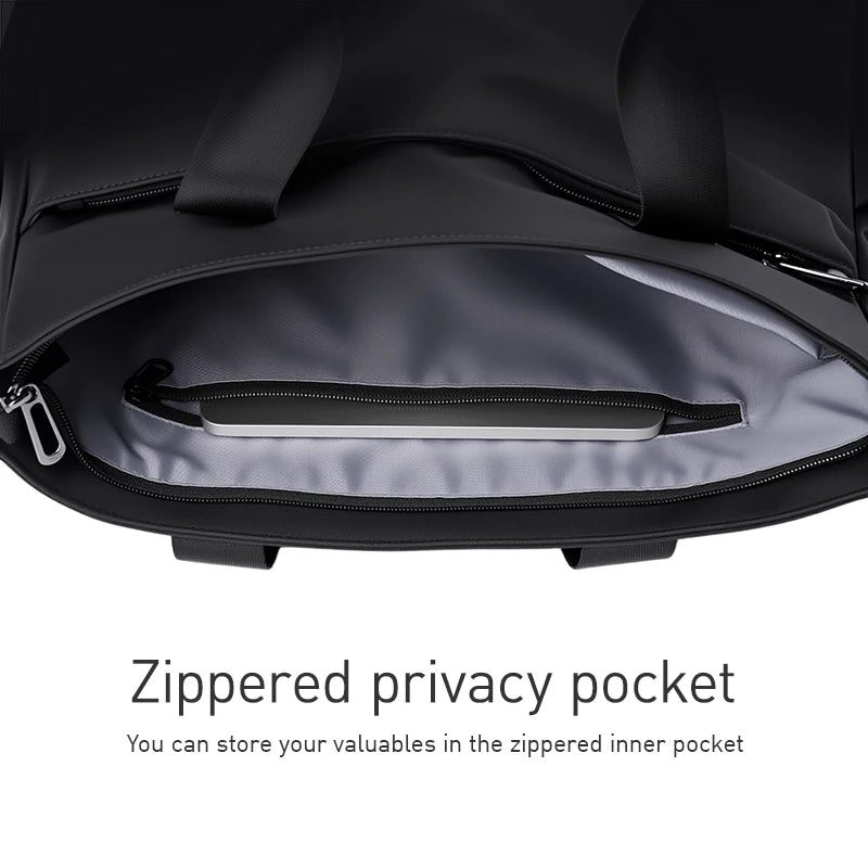 Mark Ryden black designer tote bag featuring a spacious interior with a secure zippered privacy pocket for valuables.
