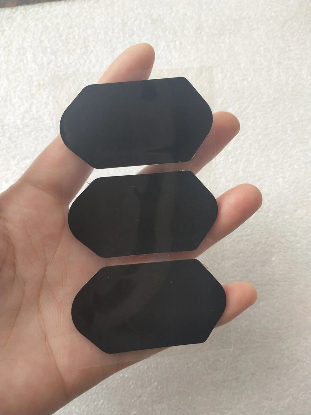 Replacement black film stickers for 3D 4D HIFU cartridge, hexagonal adhesive protective films for beauty device repair.