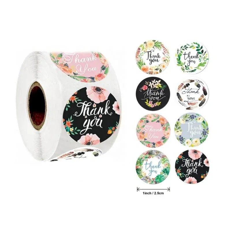 Round thank you stickers on a roll, floral wreath designs with black background