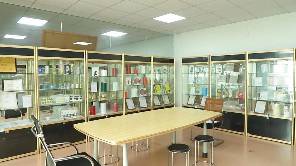 Product showroom with display shelves, glass cases, and a central table