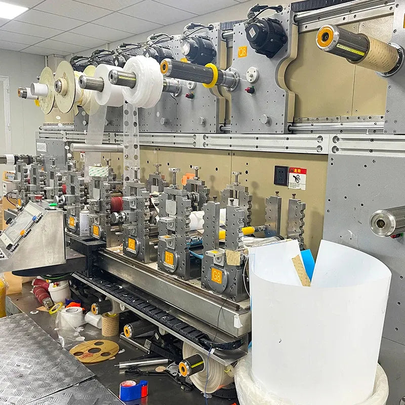 Close view of garment production machinery in a manufacturing workshop