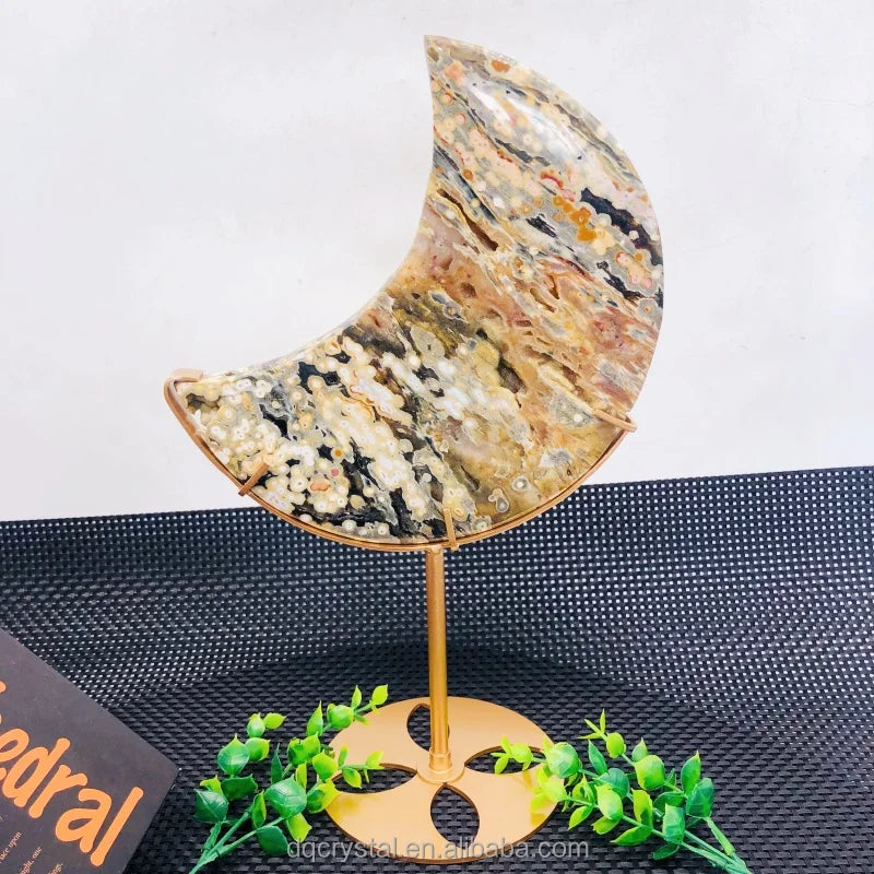 Ocean jasper moon crystal carving on gold stand, druzy dotted pattern in dark brown