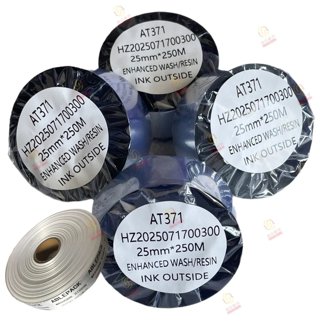 Thermal transfer resin ribbon set with three rolls plus outer tape roll, labeled AT371