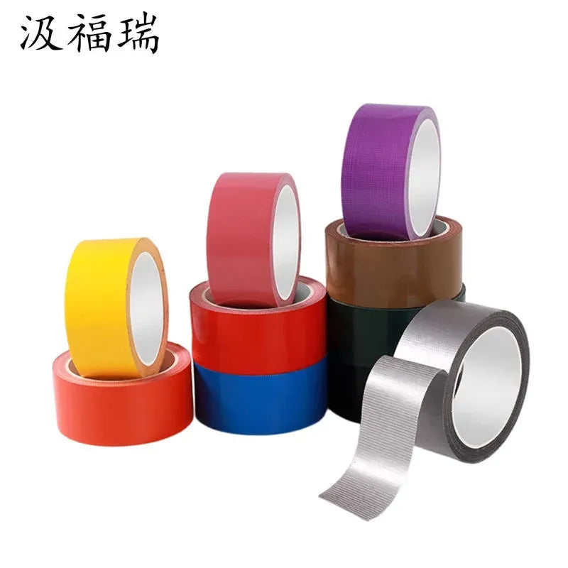 Assorted colored adhesive tape rolls: yellow, red, blue, purple, green, black