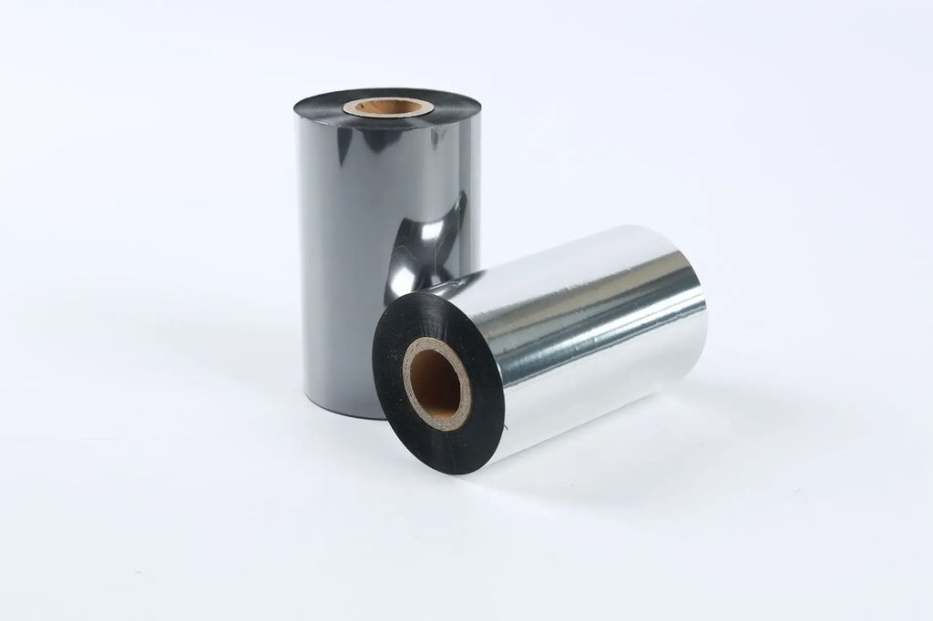 Clear BOPP packing tape roll with loose tape strip on cardboard core