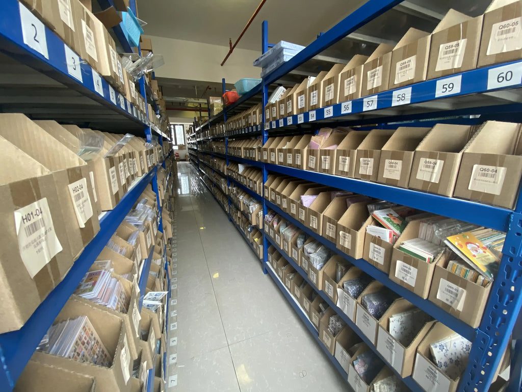 Warehouse storage aisle with blue shelving and stacked boxed supplies