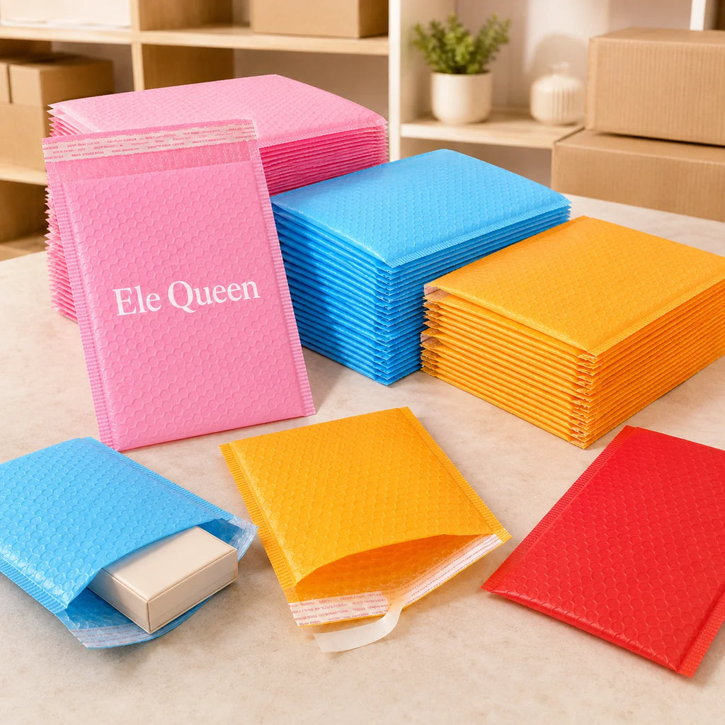 Bubble mailer envelopes in pink, blue, orange, and red with logo text