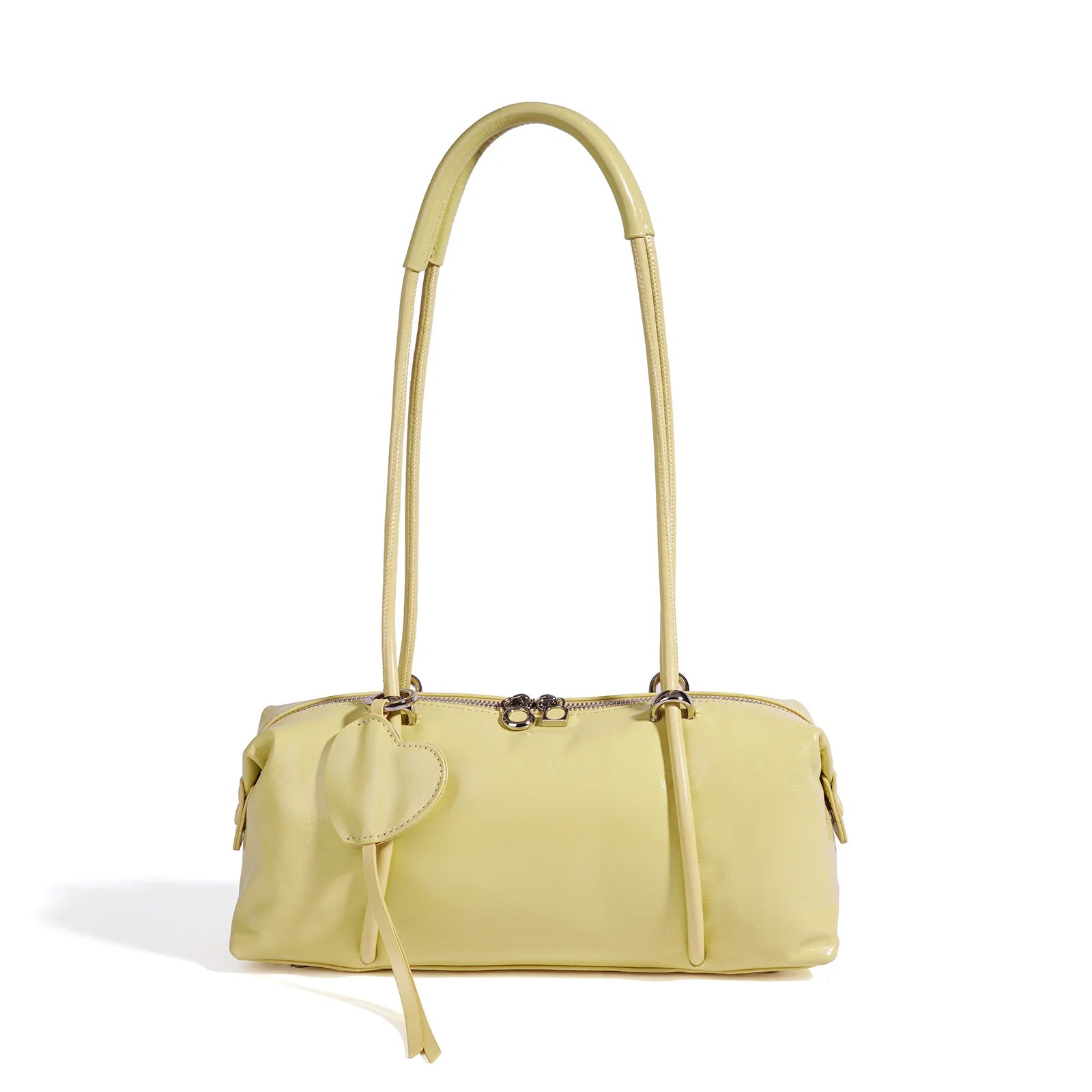 Light yellow minimalist Boston shoulder bag with luxe texture, zip closure, and heart charm. Stylish commute handbag.