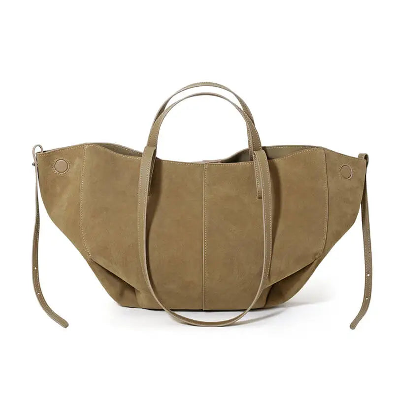 Large olive green suede leather designer tote bag with a slouchy silhouette and thin double shoulder straps.