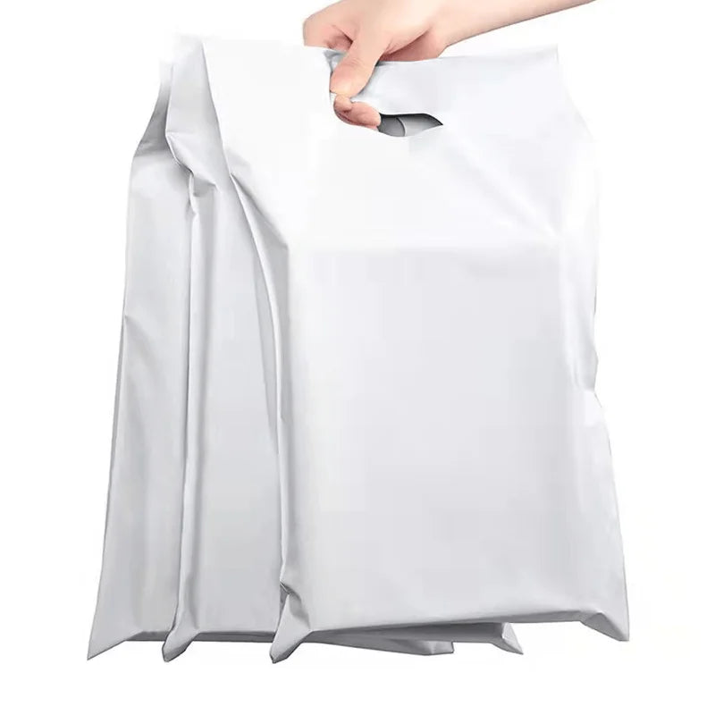 White plastic poly mailer with top handle cutout and crinkled flexible surface
