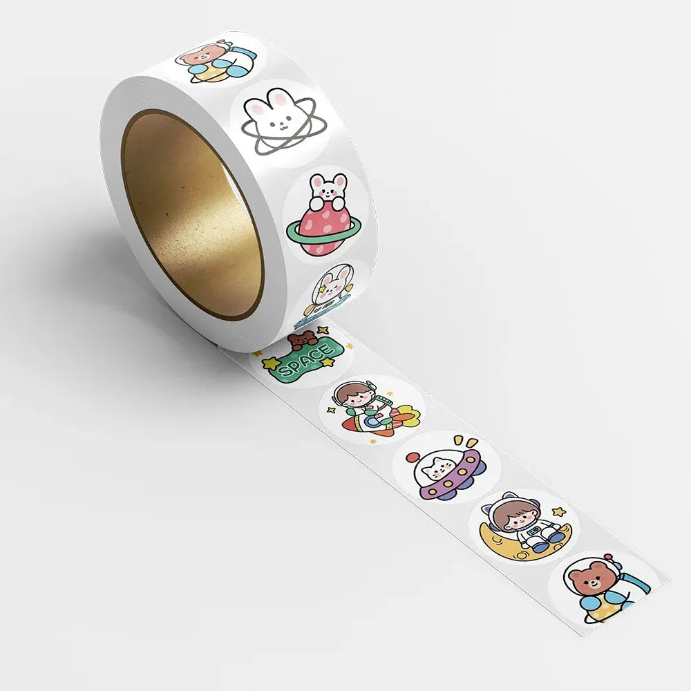 White sticker roll with a strip of cartoon animal transfer decals