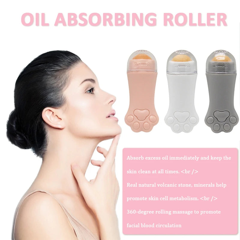 Three cat-paw shaped oil-absorbing rollers with volcanic stone balls in pink, white, and grey, next to a profile model.