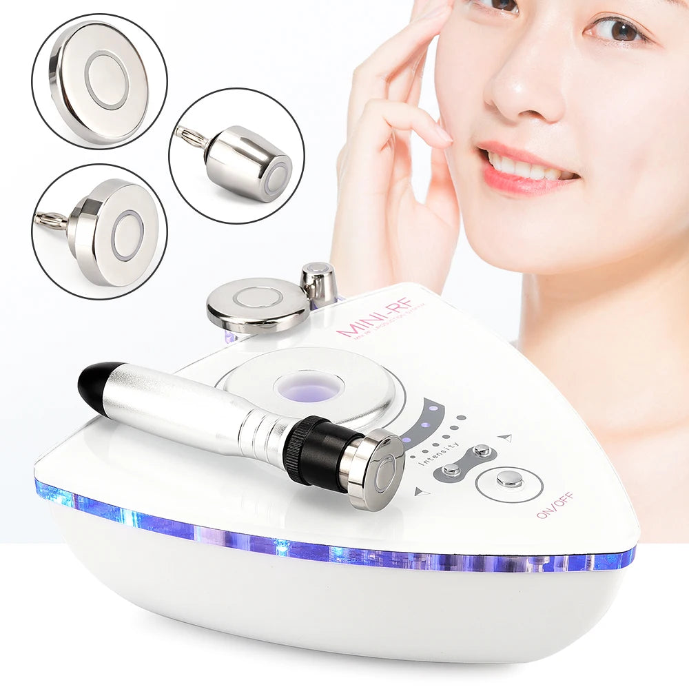 White tripolar RF beauty device with silver wand, control panel, LED light, and three detachable circular heads.