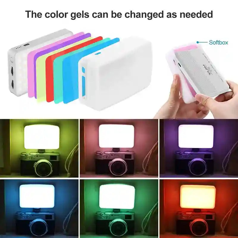 LED camera light with a rectangular frame and interchangeable colored silicone softbox gels for custom lighting effects.