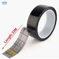 Black conductive ESD grid tape roll with gray and yellow grid pattern
