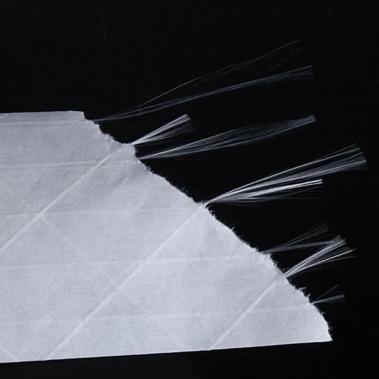 Close-up of reinforced kraft paper tape fibers with water-activated adhesive