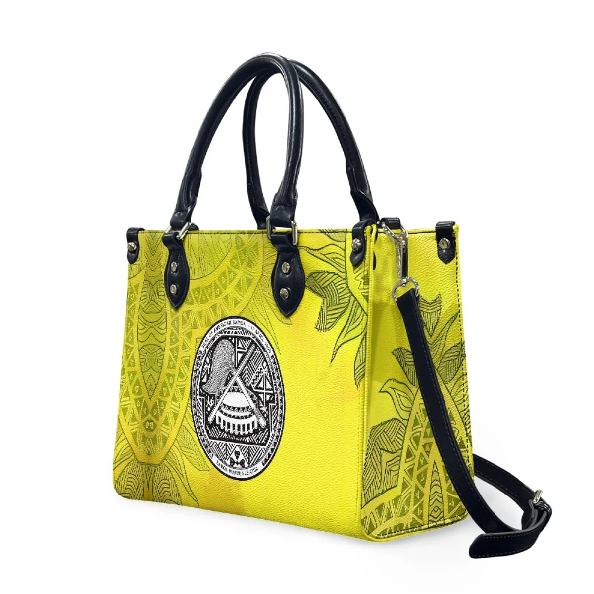 Yellow leather handbag with black Samoan tribal patterns, floral accents, and American Samoa seal, plus shoulder strap.