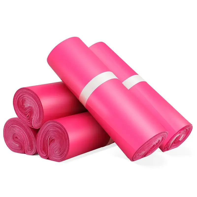 Pink plastic packing roll set with three rolls and white band