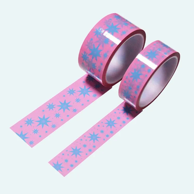 Purple and pink tamper-evident security seal tape roll with starburst pattern strip